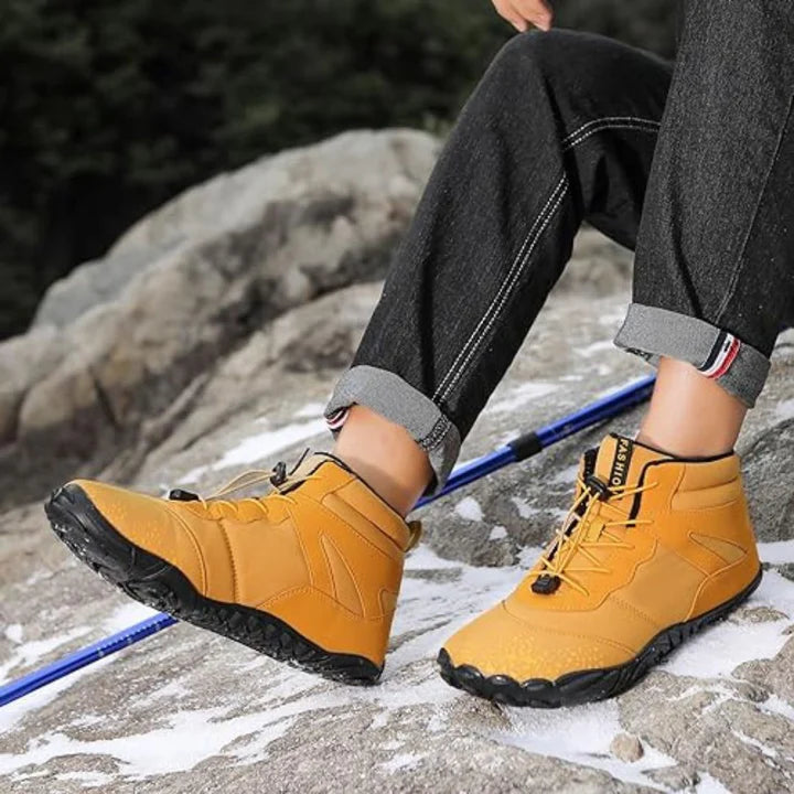 Strapazierfähige, wasserdichte Wanderschuhe mit flexibler Sohle und atmungsaktivem Design für Outdoor-Abenteuer.